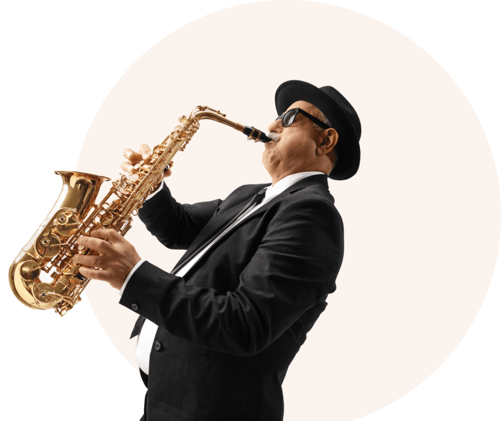 Musician playing saxophone in black attire